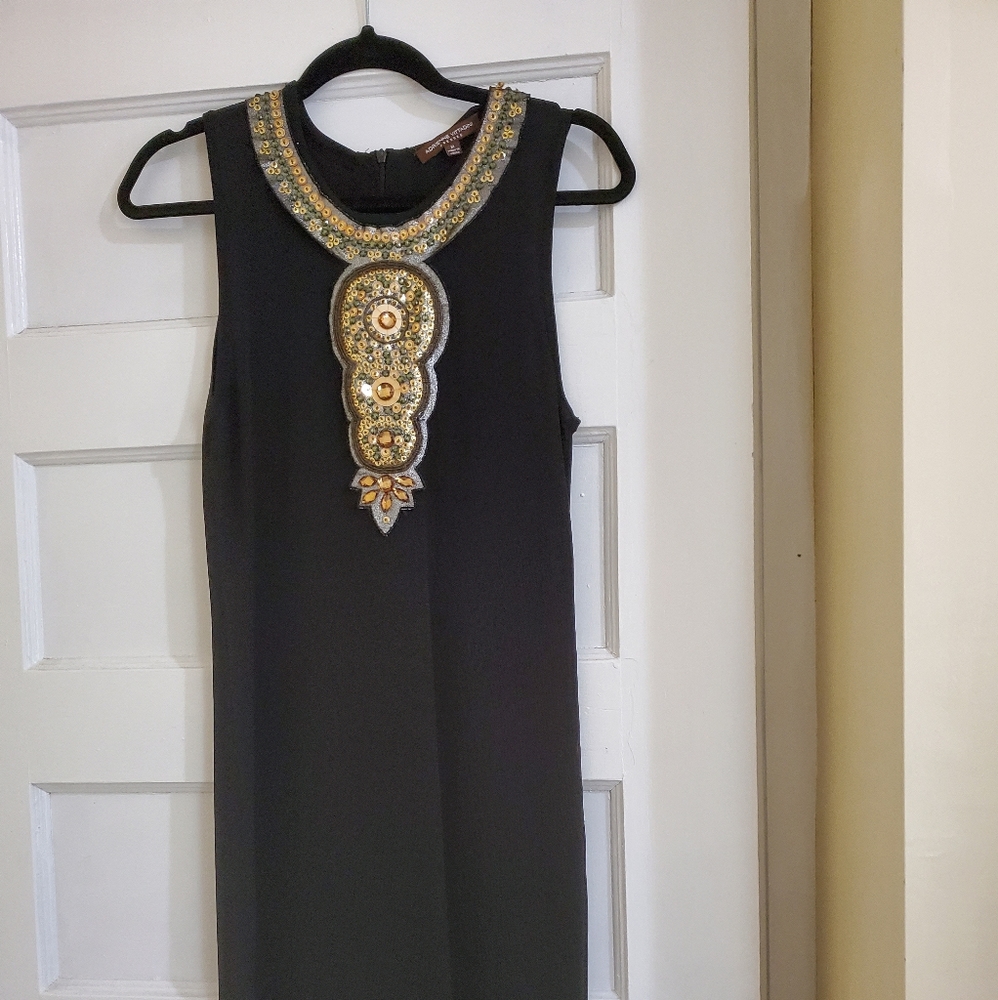 Black dress with metallic neckline